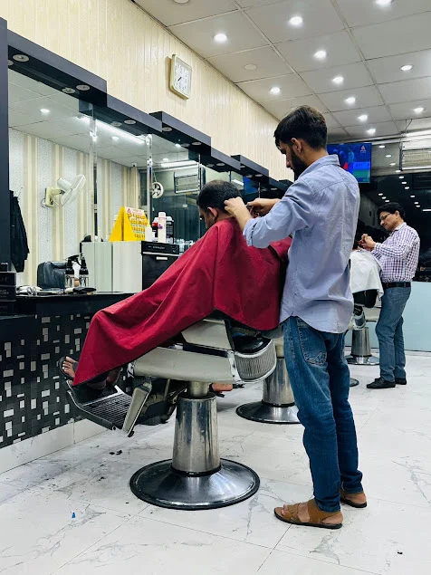 Haircut in progress at Modish Hair Salon